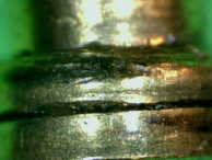 Light shearing against the bottoms of the top pins may occur during key bumping.