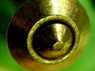 A Mul-T-Lock Classic telescoping pin tumbler that shows signs of picking tools.