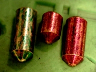 Various colored pin-tumbler pins, common in do-it-yourself repinning kits.