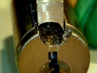 A KIK cylinder that has been drilled at the shear line to allow the plug to rotate freely.