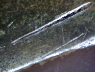 Tool marks found on the front of the european profile lock identify that it was gripped with a tool.