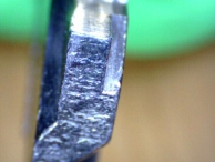 A new (few uses) factory original key, cut on a high-speed key cutter.